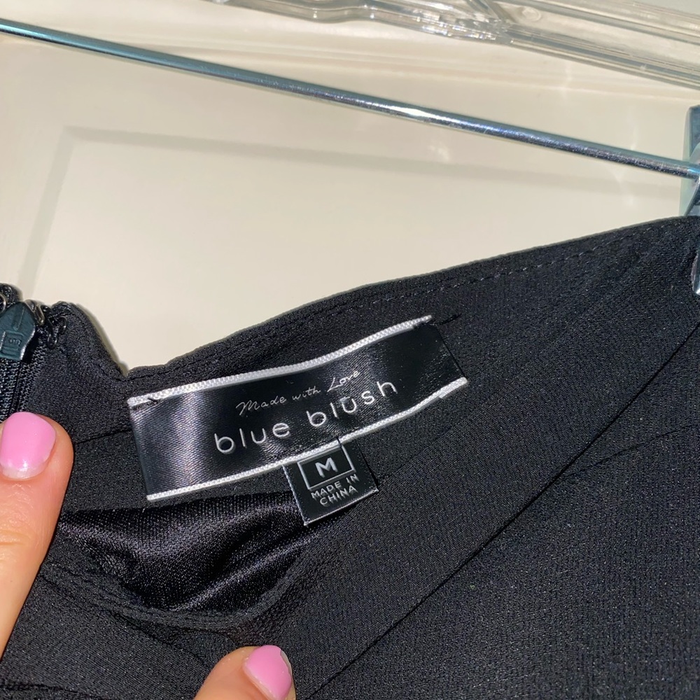 High-waisted black flare pant, size M